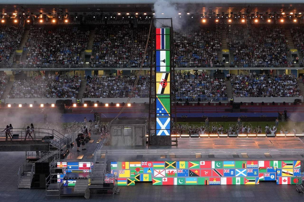 Artists perform as flags of Commonwealth countries are displayed during the Commonwealth Games closing ceremony at the Alexander stadium in Birmingham, England, Monday, Aug. 8, 2022. Alberta’s government has pulled the plug on a possible 2030 Commonwealth Games bid citing financial risk.THE CANADIAN PRESS/AP, Kirsty Wigglesworth