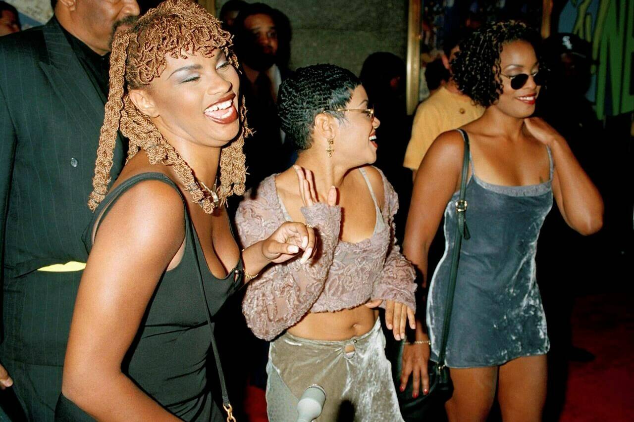 FILE - The rap group Salt-N-Pepa pose for photographers upon their arrival at New York’s Radio City Music Hall for the 11th Annual MTV Video Music Awards, Sept 8, 1994. Women have fought to shape their identification in hip-hop and demand recognition. At its 50th anniversary, female rappers are taking their moment to shine – while still demanding respect and facing decades-old challenges. (AP Photo/Malcolm Clarke, file)