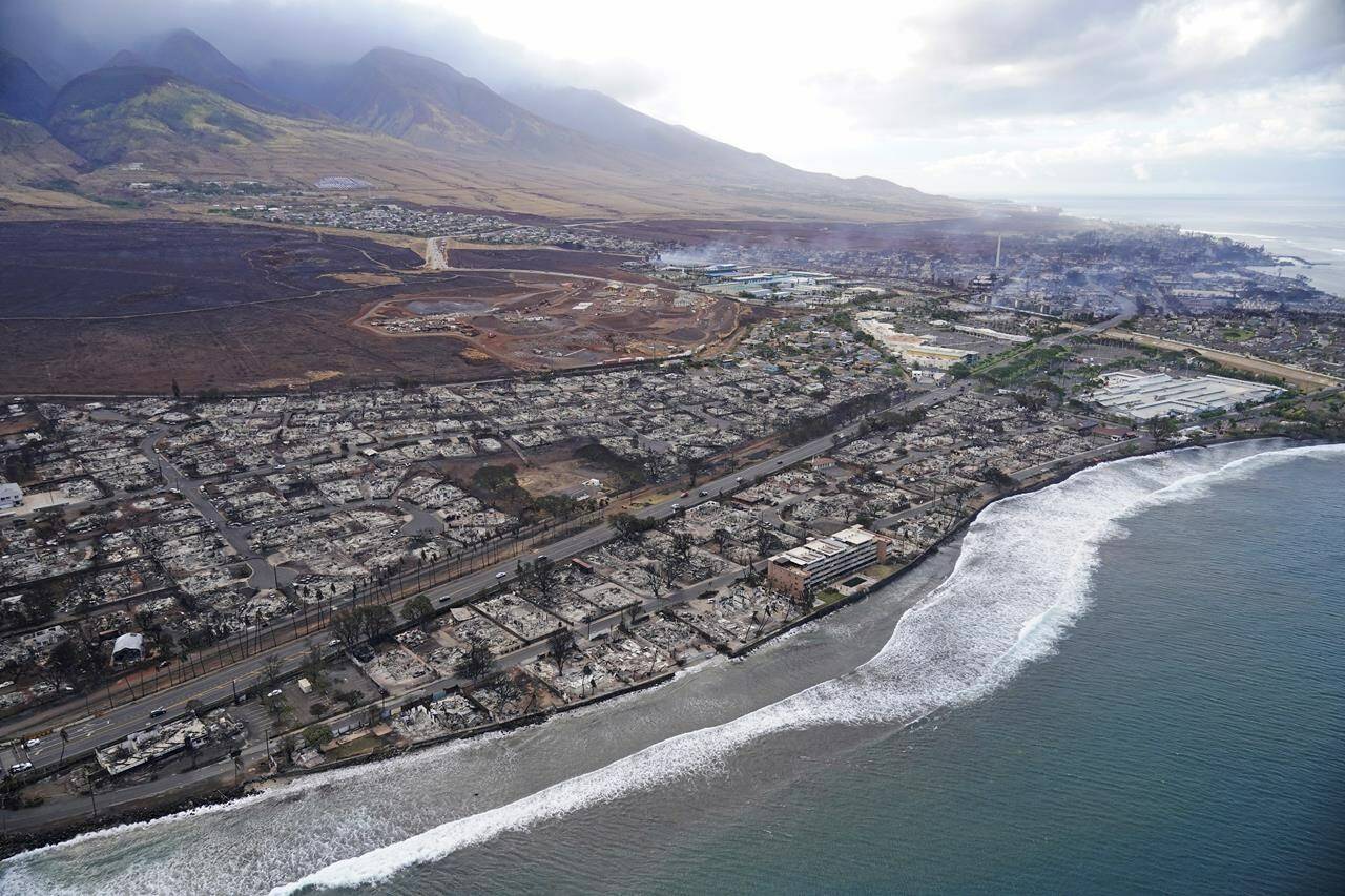 Wildfire wreckage is shown Thursday, Aug. 10, 2023, in Lahaina, Hawaii. The search of the wildfire wreckage on the Hawaiian island of Maui on Thursday revealed a wasteland of burned out homes and obliterated communities as firefighters battled the stubborn blaze making it the deadliest in the U.S. in recent years. (AP Photo/Rick Bowmer)