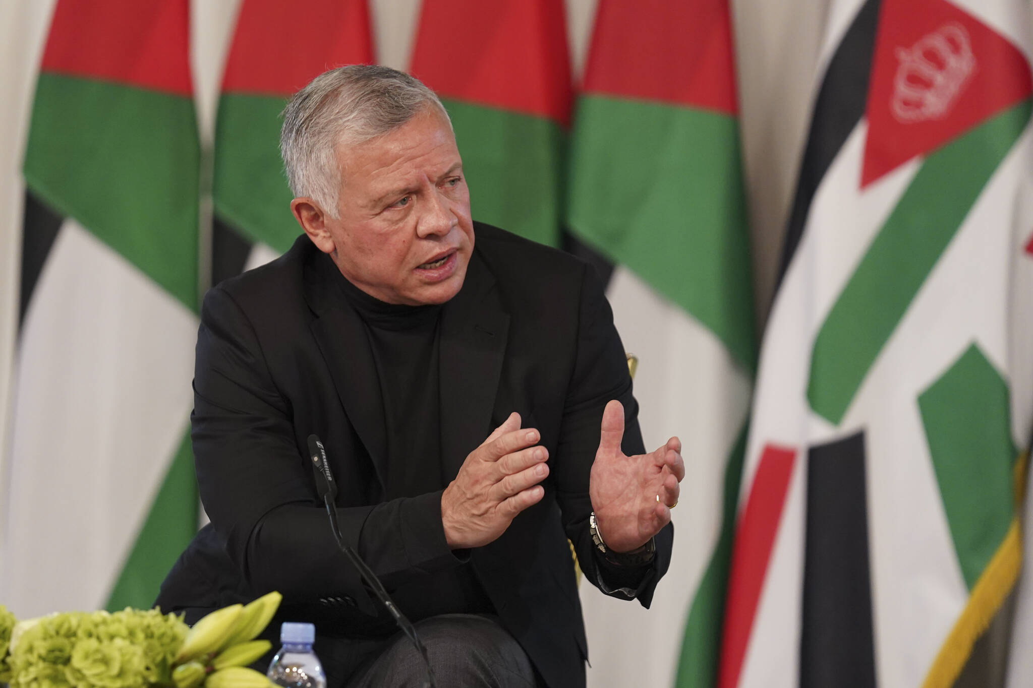 Jordan’s King Abdullah II speaks during a meeting with tribal leader in Al-Qasta, south of Amman, Jordan, Monday, Oct. 4, 2021. The King of Jordan approved a bill Saturday (Aug. 12) to punish online speech deemed harmful to national unity, according to the Jordanian state news agency, legislation that has drawn accusations from human rights groups of a crackdown on free expression in a country where censorship is on the rise. (Yousef Allan/The Royal Hashemite Court via AP)