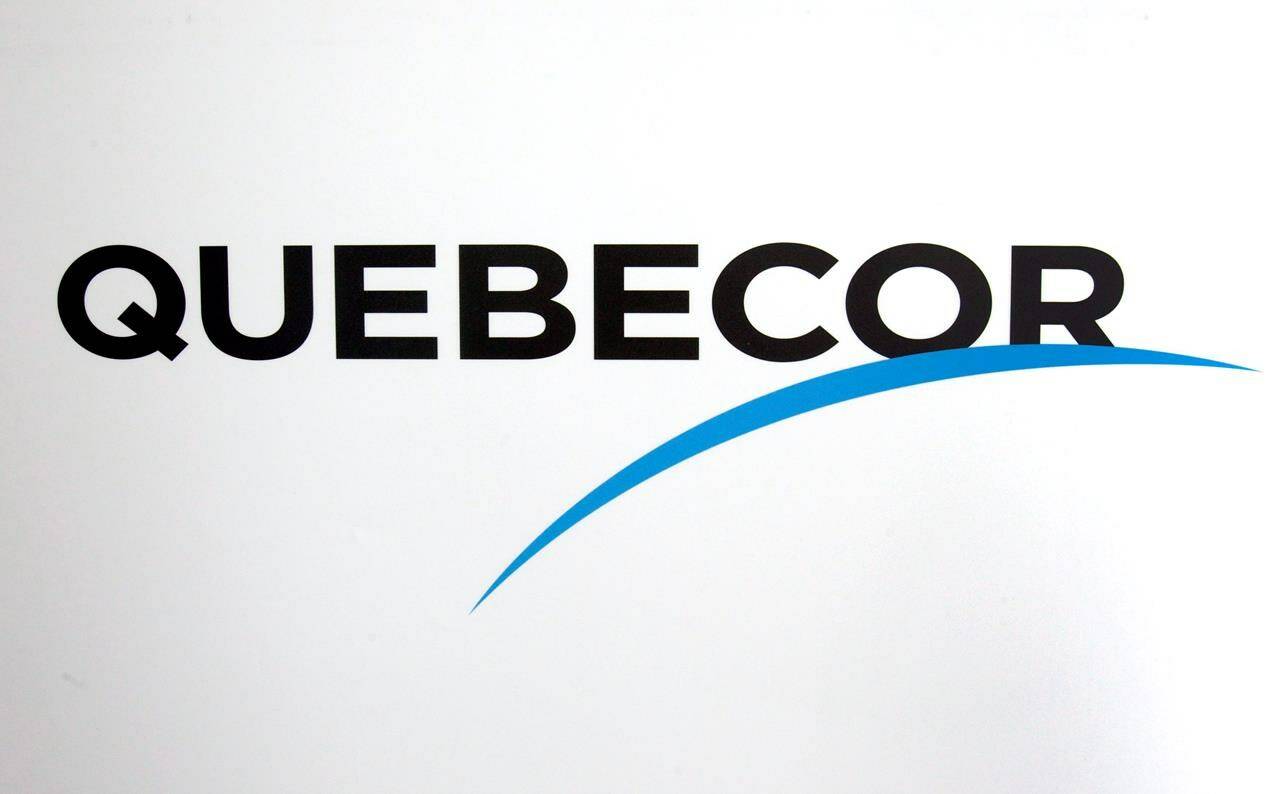 The Quebecor logo is seen at the company’s annual meeting Thursday, May 26, 2011 in Montreal. Montreal-based media and telecom conglomerate Québecor has announced it will stop paying rent for the office its political journalists use in one of Quebec’s legislature buildings, in the provincial capital. The company, which owns television station TVA and newspapers Journal de Montréal and Journal de Québec, says its rent amounts to $8,448 per month — more than $100,000 per year before tax. THE CANADIAN PRESS/Ryan Remiorz