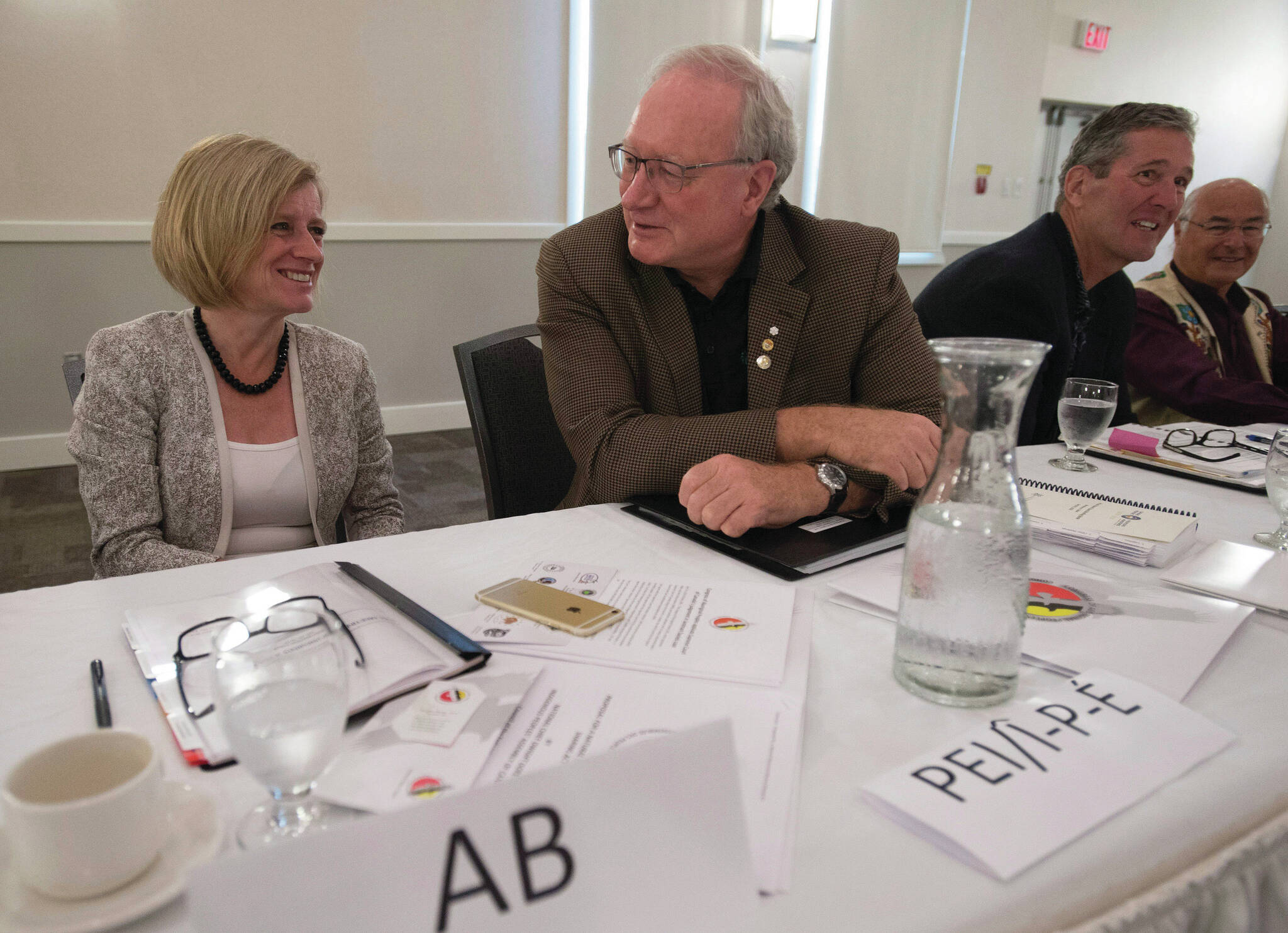 FILE - Former Alberta and Prince Edward Island premiers Rachel Notley, left, and Wade MacLauchlan as Manitoba Premier Brian Pallister looks on during a meeting of Premiers and National Aboriginal Organization leaders in Whitehorse, Yukon, Wednesday, July 20, 2016. MacLauchlan will for the second time chair the advisory body looking for Canada’s next Supreme Court of Canada Justice. THE CANADIAN PRESS/Jonathan Hayward