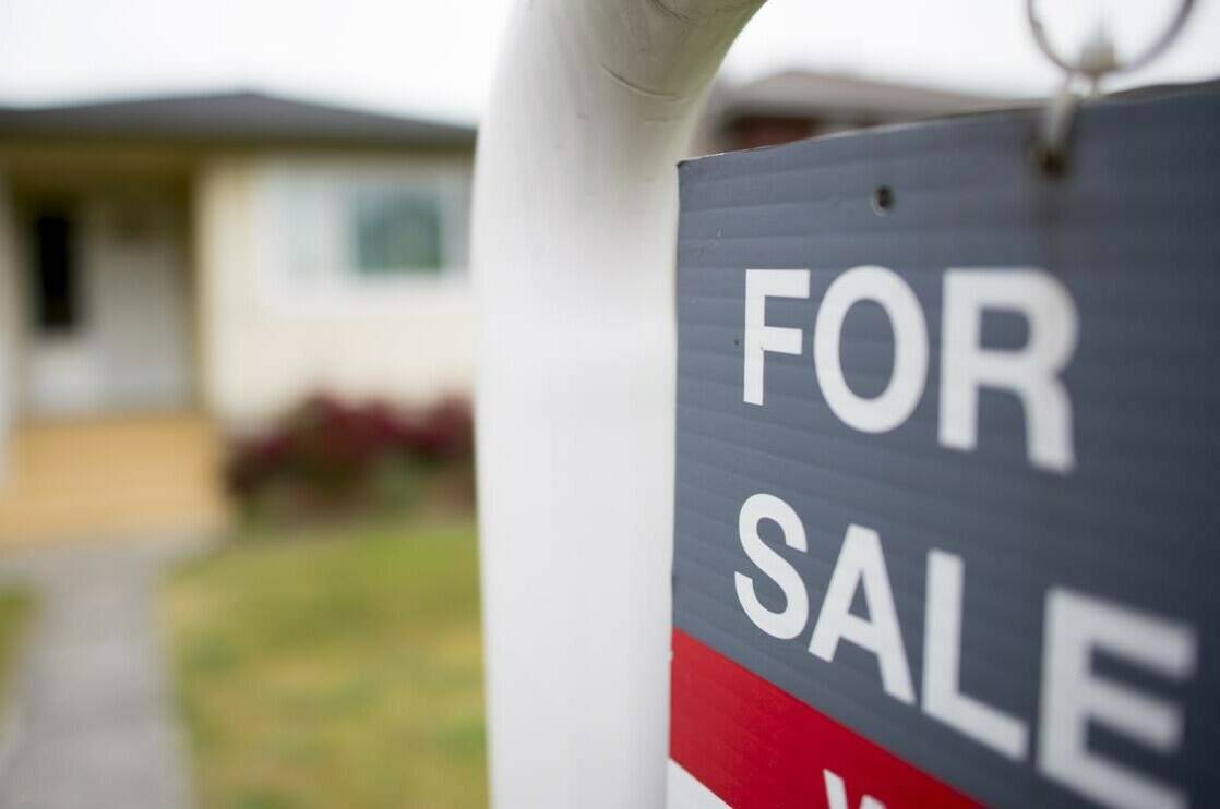 For the federal Liberals, the growing discontent with the state of the housing market is becoming a political threat. A real estate sign is pictured in Vancouver on Tuesday, June 12, 2018. THE CANADIAN PRESS Jonathan Hayward