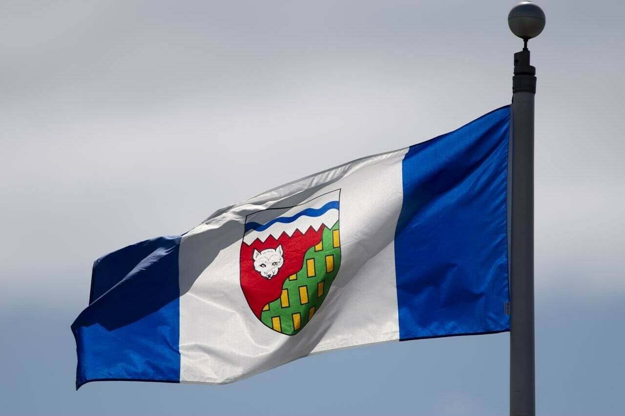 <div>Transportation authorities in the Northwest Territories say the highway out of a community near the Alberta boundary that’s being evacuated due to wildfires has now closed. The Northwest Territories provincial flag flies on a flag pole in Ottawa on June 30, 2020. THE CANADIAN PRESS/Adrian Wyld</div>