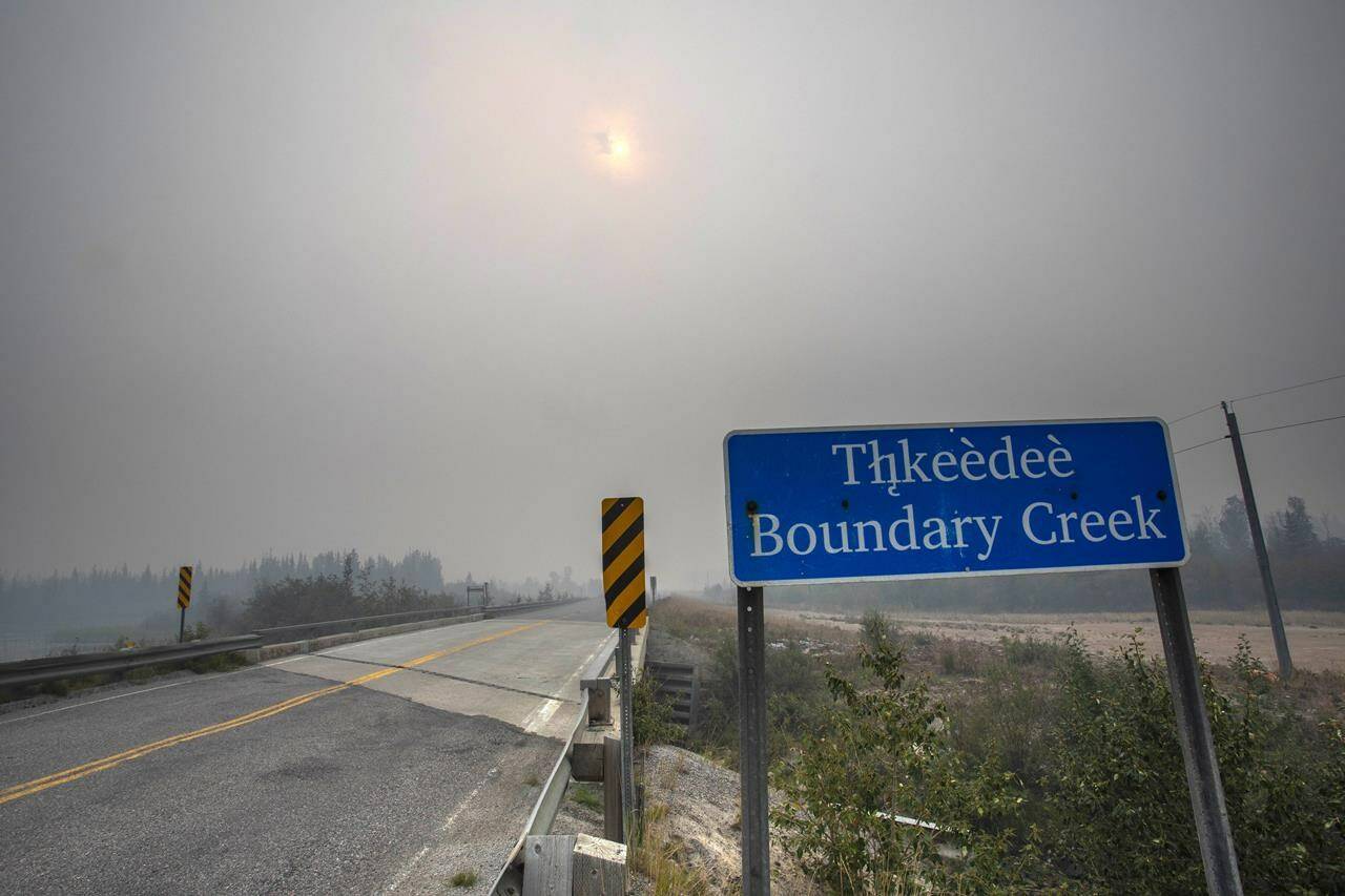 Wildfire smoke fills the air at Boundary Creek, Northwest Territories about 25 kilometers east of Yellowknife, on Tuesday Aug. 15, 2023. THE CANADIAN PRESS/Bill Braden