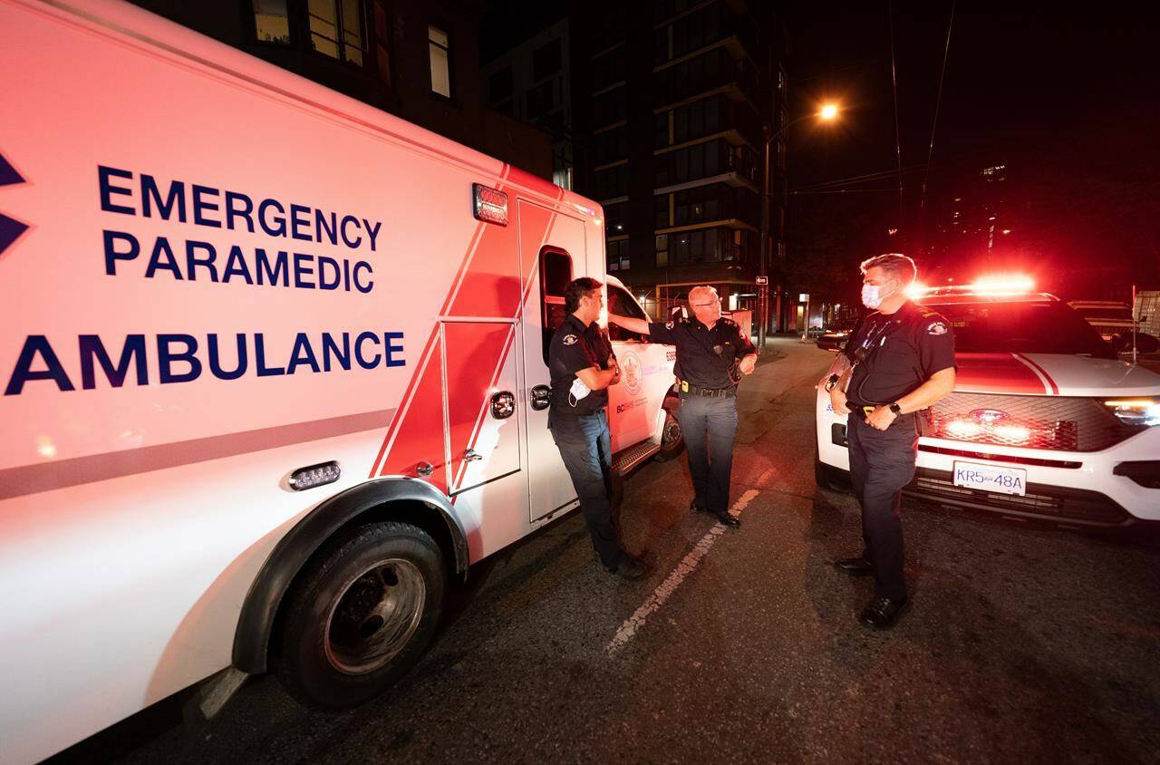 A new survey says an alarming number of kids age 12 and older have been treated for drug overdoses in Canada. Paramedics debrief after responding to a drug overdose in Vancouver on Wednesday, June 23, 2021.THE CANADIAN PRESS/Jonathan Hayward