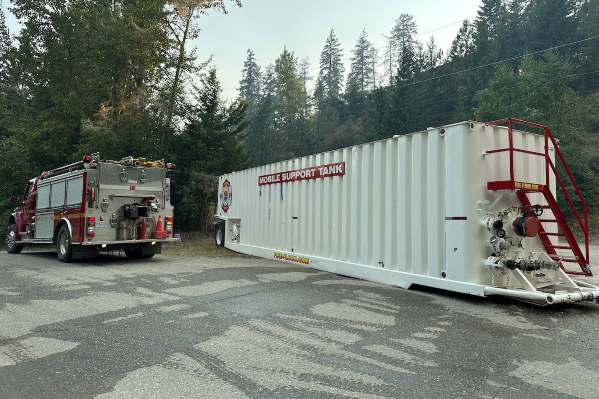 Equipment belonging to a structure protection crew that set up sprinklers at residences in Lee Creek. (Jim Cooperman photo)