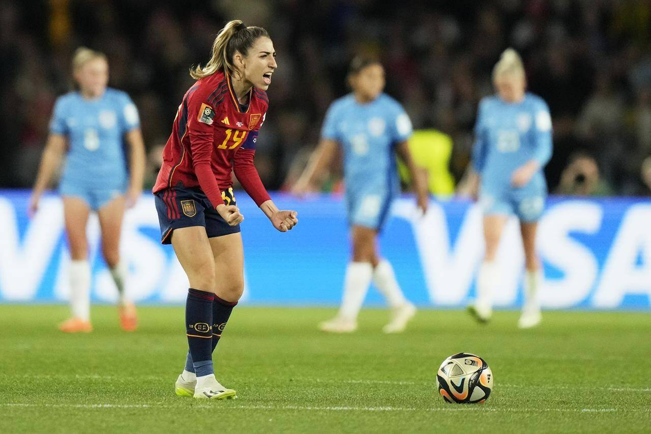 Spain’s Olga Carmona celebrates after scoring the opening goal during the final of Women’s World Cup soccer between Spain and England at Stadium Australia in Sydney, Australia, Sunday, Aug. 20, 2023. (AP Photo/Rick Rycroft)