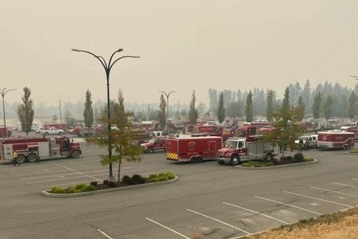 Fire trucks and equipment from departments across B.C. staged at UBC Okanagan, Aug. 20, 2023. (Contributed)