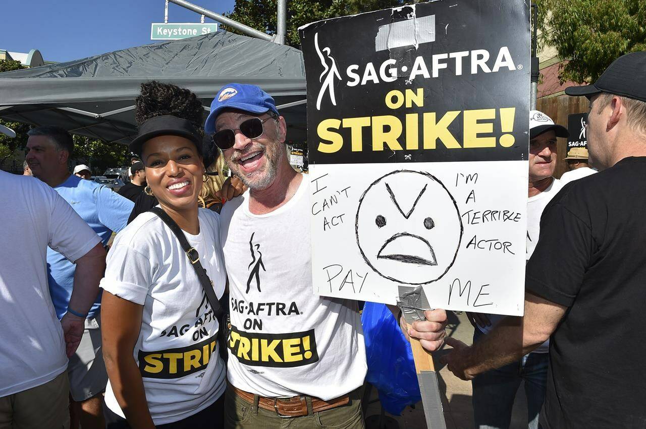 Kerry Washington, left, and Joshua Malina attend a Day of Solidarity union rally on Tuesday, Aug. 22, 2023, at Disney Studios in Burbank, Calif. The event includes members of SAG-AFTRA, the WGA and the AFL-CIO. (Photo by Jordan Strauss/Invision/AP)