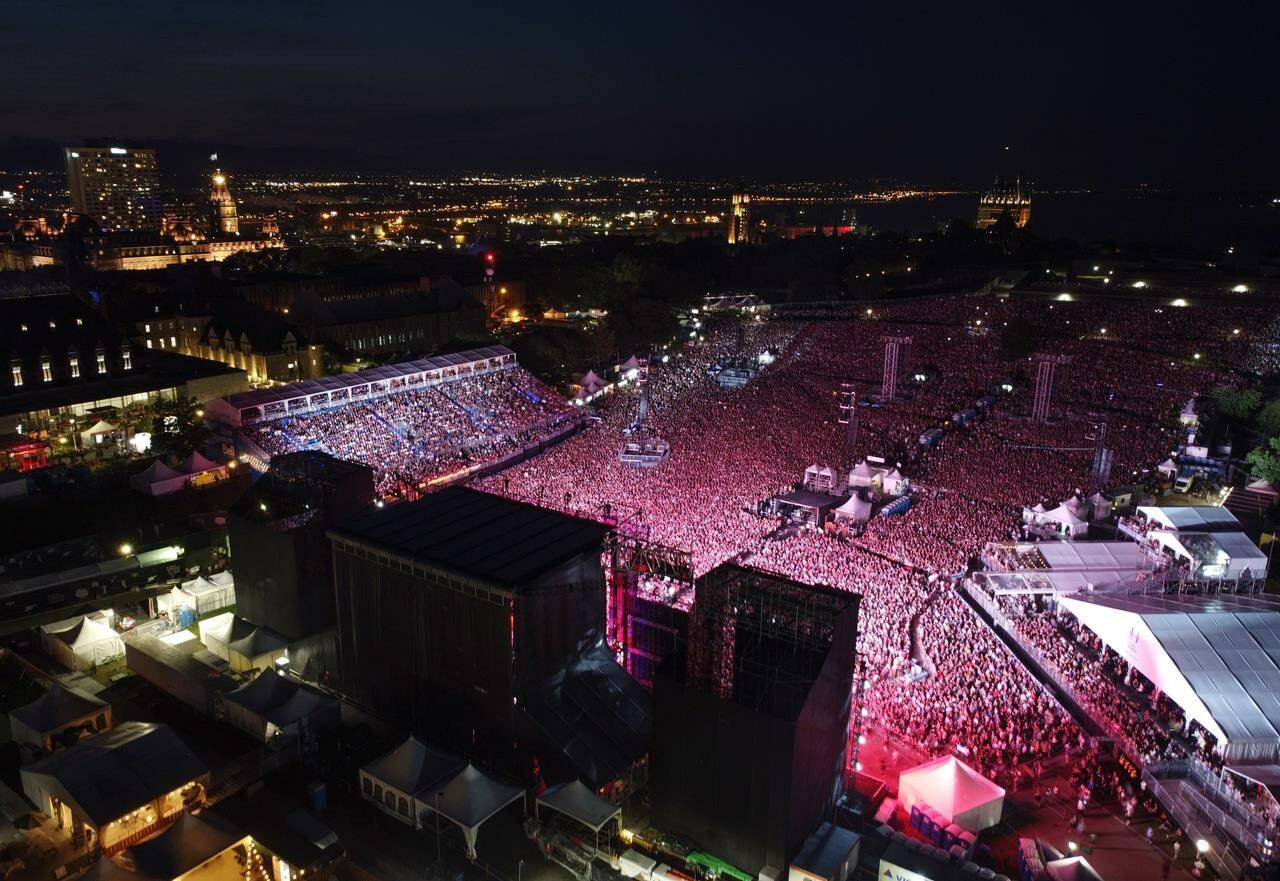 A new report from Statistics Canada says the return of live shows and events after pandemic restrictions revived the country’s performing arts industry in 2022, with significant revenue and salary growth in specific sectors. An aerial view of the Foo Fighters concert on Saturday, July 8, 2023 at the Quebec Summer Festival in Quebec City. THE CANADIAN PRESS/Jacques Boissinot