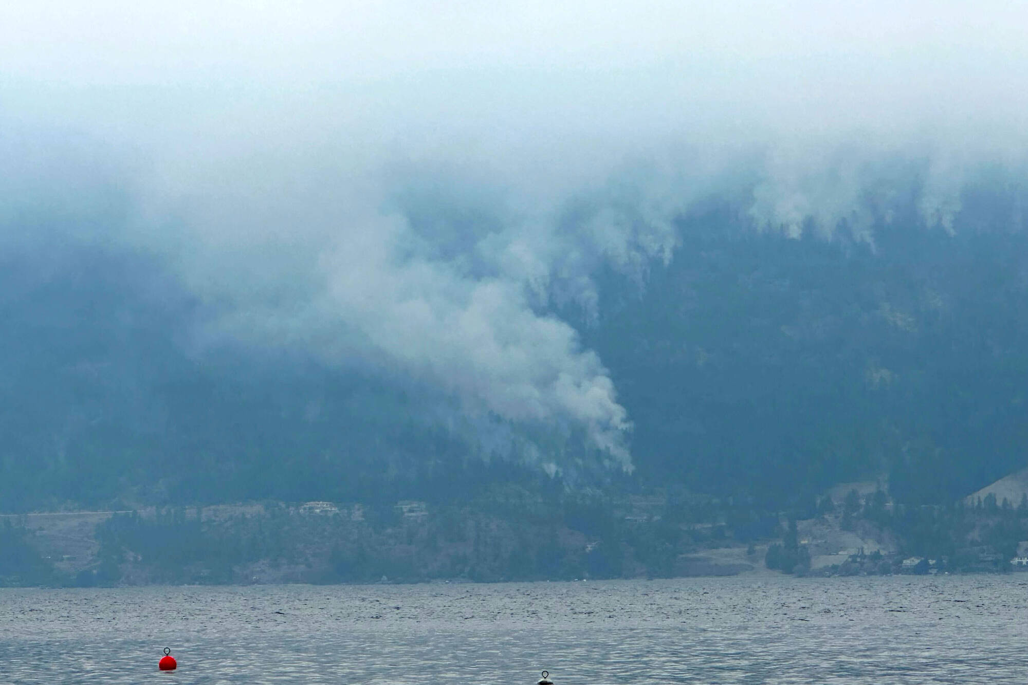 Trails of wildfire smoke seen from Okanagan Centre south of Ceasars close to Shelter Cove Tuesday, April 22, 2023. (Jordy Cunningham - Black Press Media)