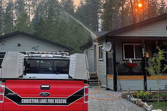 RDKB Area C/Christina Lake Director Grace McGregor hopes to lead by example. She participated in the Christina Lake Fire Rescue sprinkler program and installed a WASP gutter-mounted sprinkler system on her own Christina Lake home. Homes that observe FireSmart principles and install sprinkler systems are more likely to withstand wildfire. Photo: Submitted