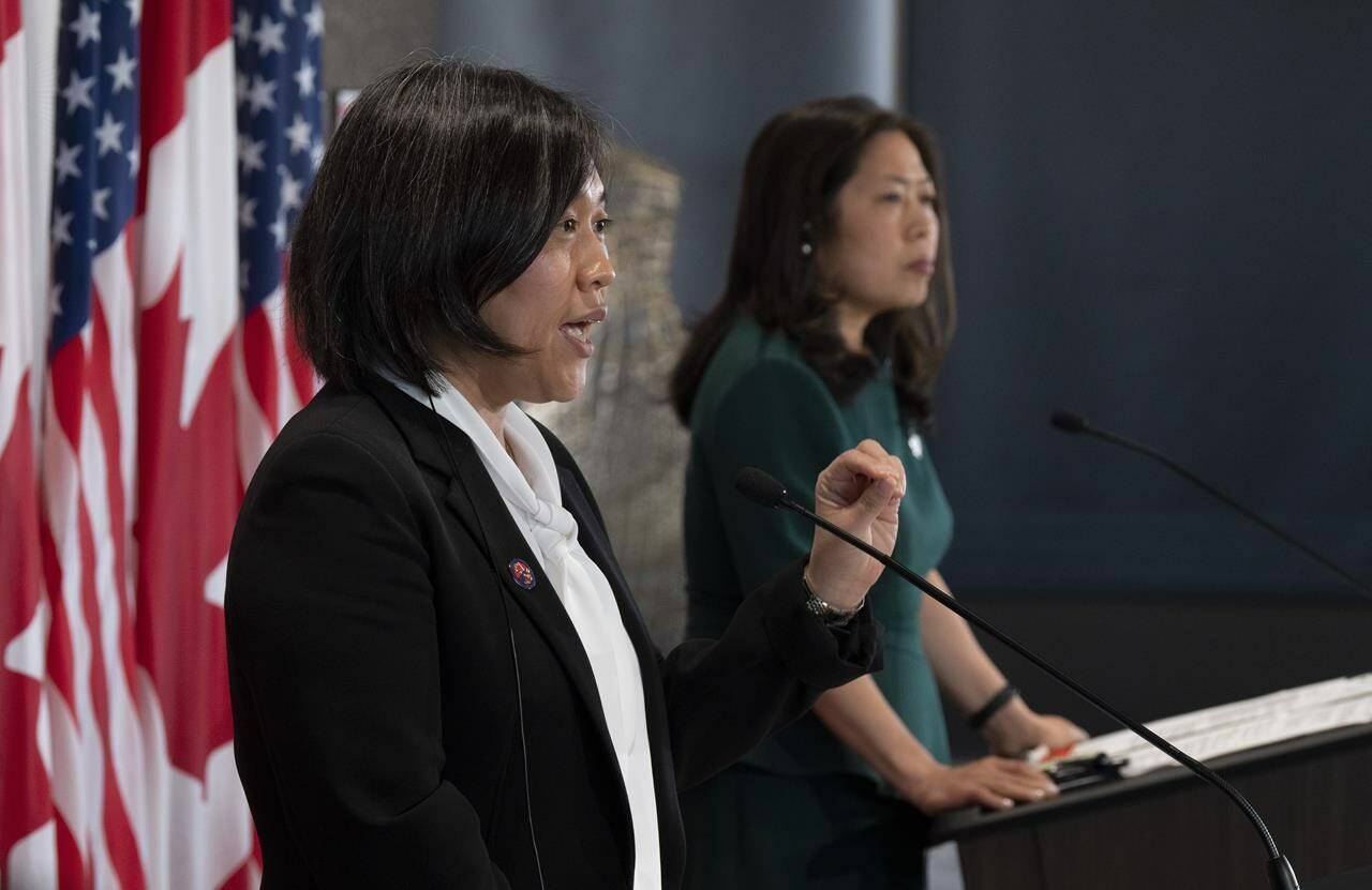 International Trade Minister Mary Ng, right, looks on as U.S. Trade Representative Katherine Tai speaks during a joint news conference in Ottawa, Thursday, May 5, 2022. Canada is siding with the U.S. in an ongoing trade dispute over Mexico’s restrictions on importing products made with genetically modified corn. THE CANADIAN PRESS/Adrian Wyld