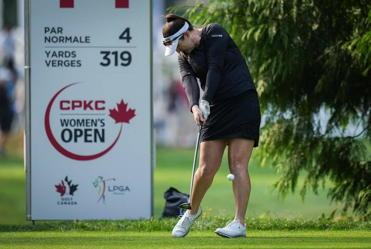 Brigitte Kim Thibault, of Canada, hits her tee shot on the 14th hole during the second round at the LPGA CPKC Canadian Women’s Open golf tournament, in Vancouver, on Friday, August 25, 2023. THE CANADIAN PRESS/Darryl Dyck