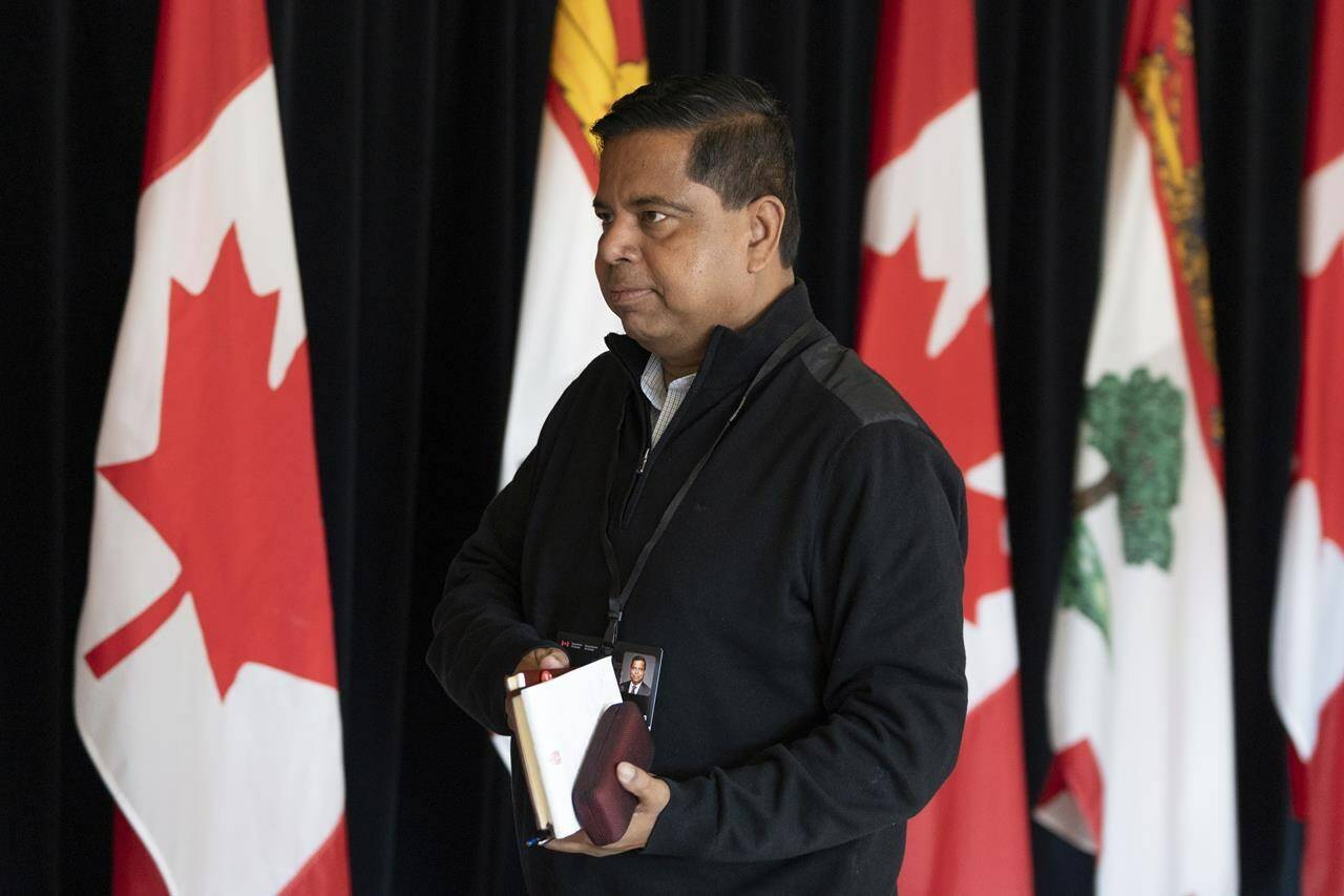 Minister of Crown-Indigenous Relations Gary Anandasangaree walks past members of the media during the Liberal Cabinet retreat in Charlottetown, Tuesday, Aug. 22, 2023. Canada changed the way it settles First Nation land claims, Crown-Indigenous Relations and Northern Affairs Canada confirmed Friday. THE CANADIAN PRESS/Darren Calabrese