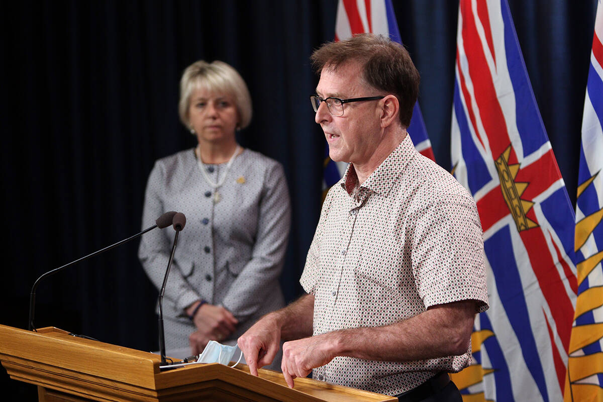 Provincial Health Officer Dr. Bonnie Henry looks on as Health Minister Adrian Dix speaks during a press conference at provincial legislature in Victoria, Aug. 23, 2021. Dix and Henry are confirming the province’s first case of a new COVID-19 variant in the province as of Aug. 29, 2023. THE CANADIAN PRESS/Chad Hipolito