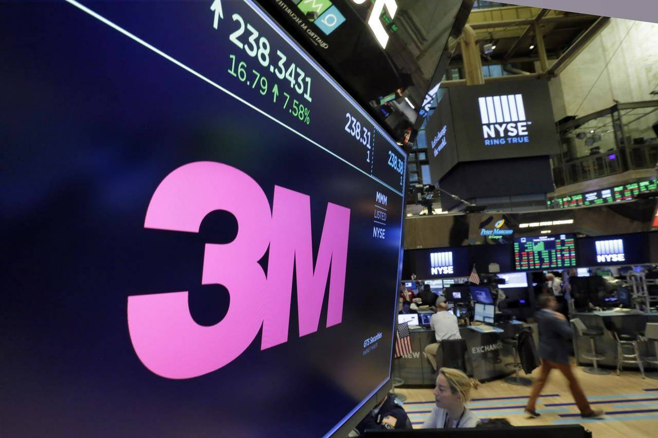 FILE - The logo for 3M appears on a screen above the trading floor of the New York Stock Exchange, Oct. 24, 2017. 3M, on Tuesday, Aug. 29, 2023, has agreed to pay $6 billion to settle numerous lawsuits from U.S. service members who say they experienced hearing loss or other serious injuries from using earplugs made by the company. (AP Photo/Richard Drew, File)