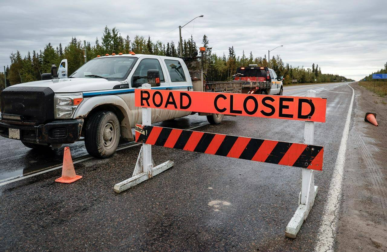 A state of emergency in the Northwest Territories has been extended until Sept. 11. The road is closed north to Yellowknife from Fort Providence, N.W.T., Thursday, Aug. 17, 2023. THE CANADIAN PRESS/Jeff McIntosh