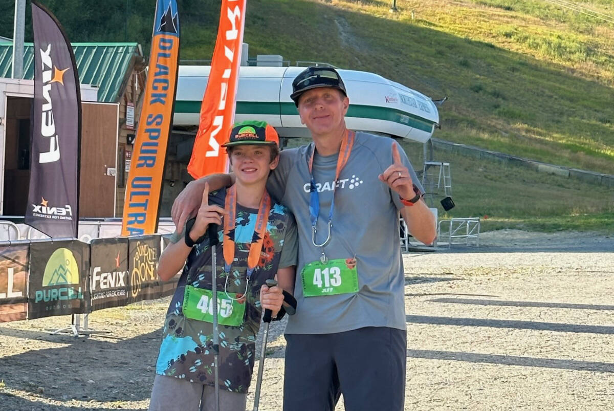 Ben Taylor-Vallance (left) with his dad Jeff Vallance, pose shortly after completing the 54-km Black Spur Ultra Race. Ben, 13, is the youngest-ever finisher of this race. Photo submitted.