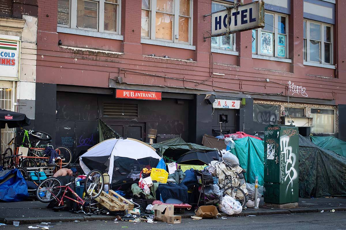 Tents line the sidewalk on East Hastings Street in the Downtown Eastside of Vancouver, on Thursday, July 28, 2022. THE CANADIAN PRESS/Darryl Dyck