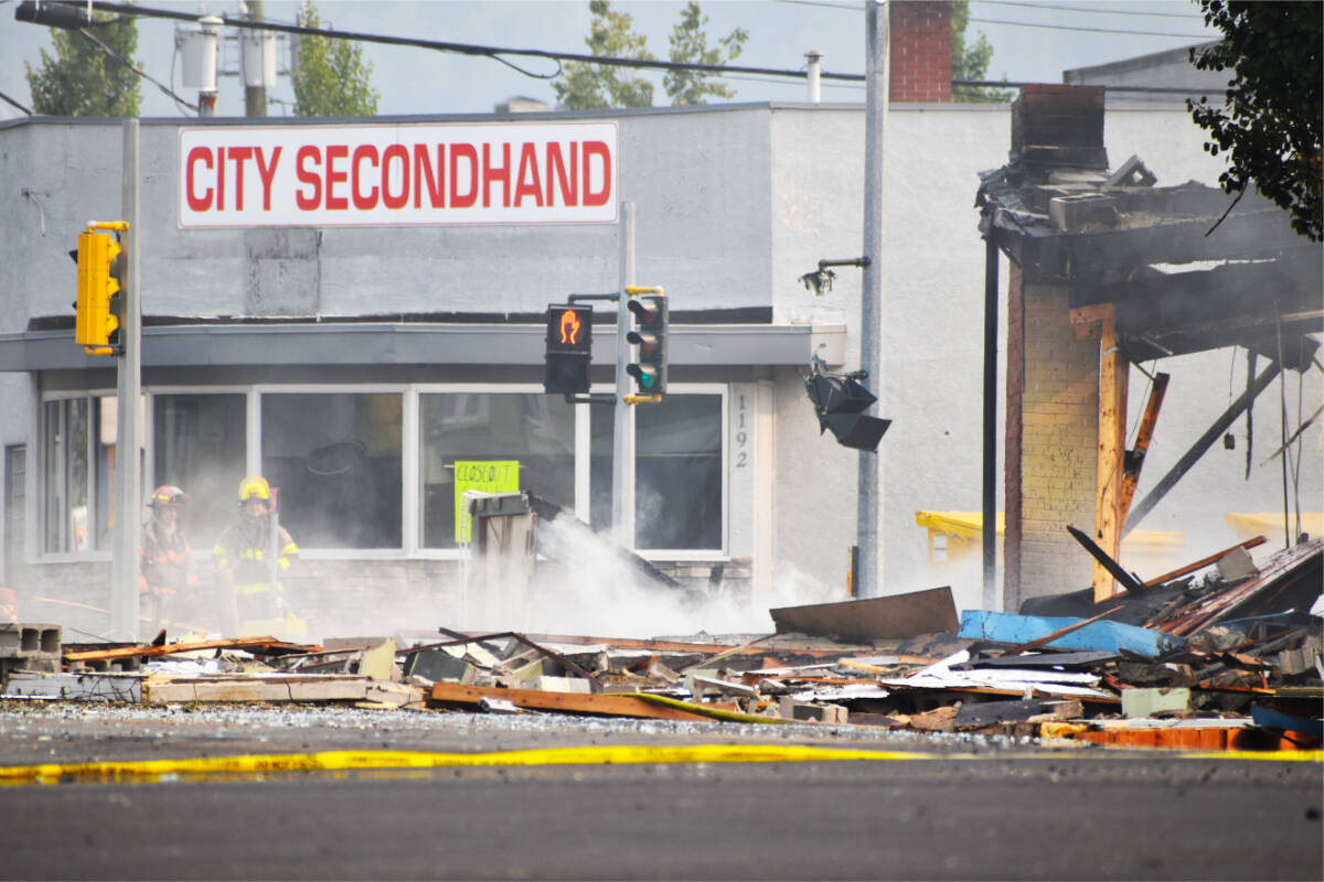 Debris blew up the block from the explosion that utterly destroyed the long abandoned Achillion Restaurant in downtown Prince George on Aug. 22, 2023. (Frank Peebles photo - Quesnel Cariboo Observer)