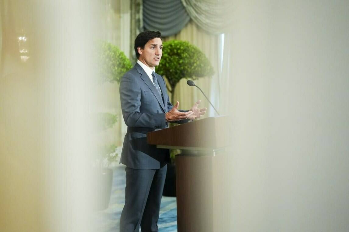 Prime Minister Justin Trudeau is reflected in a mirror as he holds a press conference in Singapore on Friday, Sept. 8, 2023. THE CANADIAN PRESS/Sean Kilpatrick