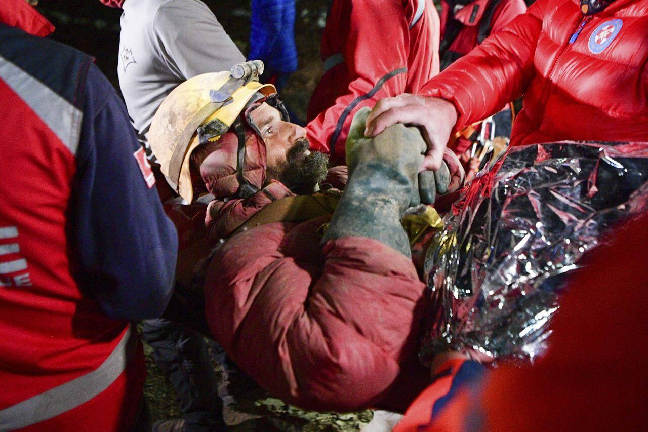 American researcher Mark Dickey is carried in a stretcher after being pulled out of Morca cave near Anamur, south Turkey, on early Tuesday, Sept. 12, 2023, more than a week after he became seriously ill 1,000 meters (more than 3,000 feet) below its entrance. Teams from across Europe had rushed to Morca cave in southern Turkey’s Taurus Mountains to aid Dickey, a 40-year-old experienced caver who became seriously ill on Sept. 2 with stomach bleeding. (Mert Gokhan Koc/Dia Images via AP)