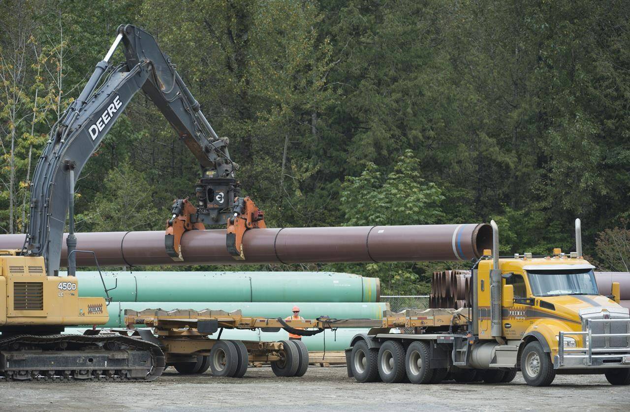 Pipeline pipes are seen at a Trans Mountain facility near Hope, B.C., Thursday, Aug. 22, 2019. The crown corporation behind the Trans Mountain pipeline expansion says it may not complete the project before December 2024 if a regulator does not approve its request for a route deviation.THE CANADIAN PRESS/Jonathan Hayward