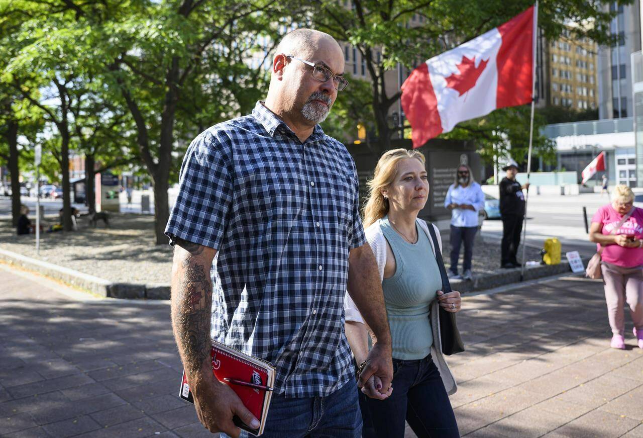 Chris Barber arrives for his trial at the courthouse in Ottawa, on Monday, Sept. 11, 2023. The court is expected to watch several lengthy press conferences hosted by the “Freedom Convoy” as the criminal trial for two of the protest’s organizers enters its seventh day.THE CANADIAN PRESS/Justin Tang