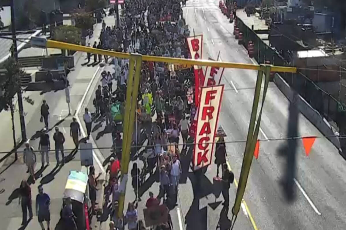 Protesters march down Cambie Street in Vancouver Friday (Sept. 15, 2023) as part of the Global Fight to End Fossil Fuels marches in Canada this weekend. (Vancouver traffic cameras/Vancouver.ca)