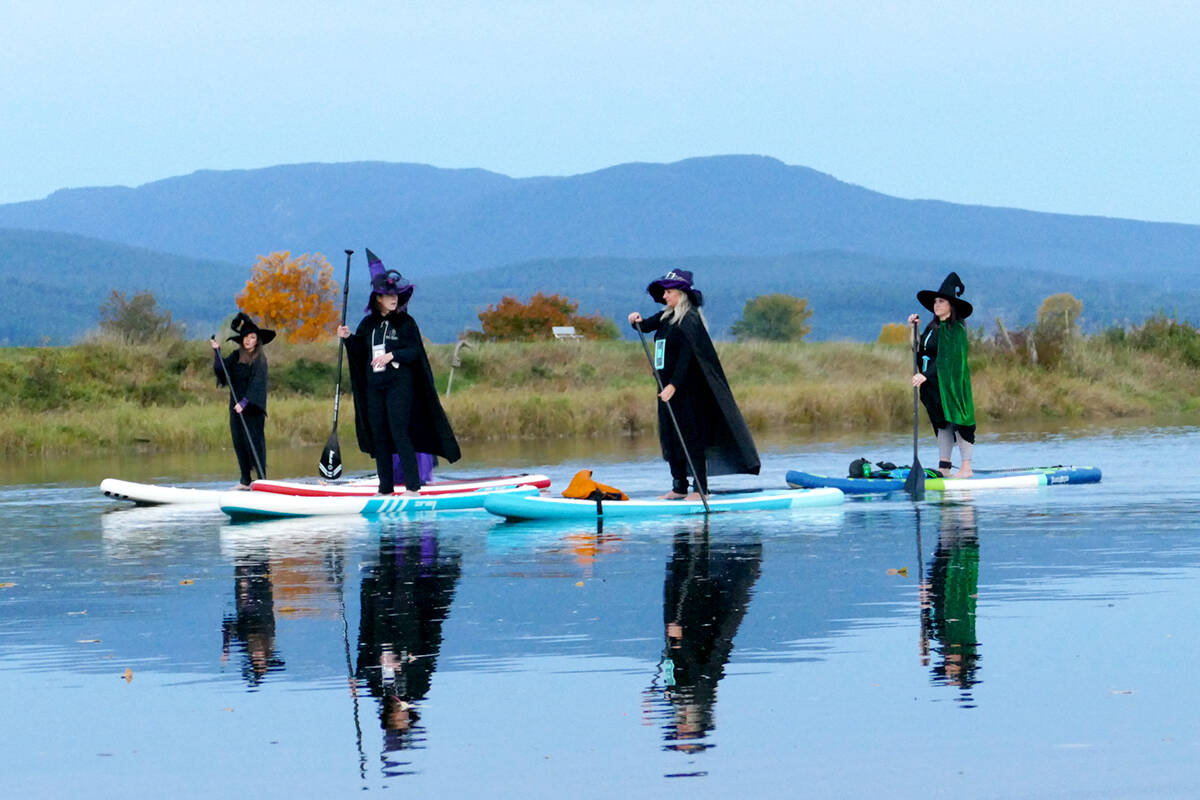 A swarm of witches paddled across the Alouette River in Pitt Meadows at a former event. (The News files)