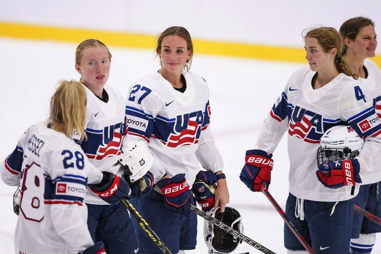 FILE - Team USA Taylor Heise (27) with teammates after the IIHF World Championship Women’s ice hockey match against Japan in Herning, Denmark, Thursday, Aug. 25, 2022. The newly launched Professional Women’s Hockey League is taking shape. Each of the six franchise’s head coaches are expected to be announced on Friday, Sept. 15. And Minnesota is looking ahead to the league’s inaugural draft on Monday, when the yet-to-be-named franchise is expected to select Taylor Heise with the No. 1 pick. (Bo Amstrup/Ritzau Scanpix via AP, File)
