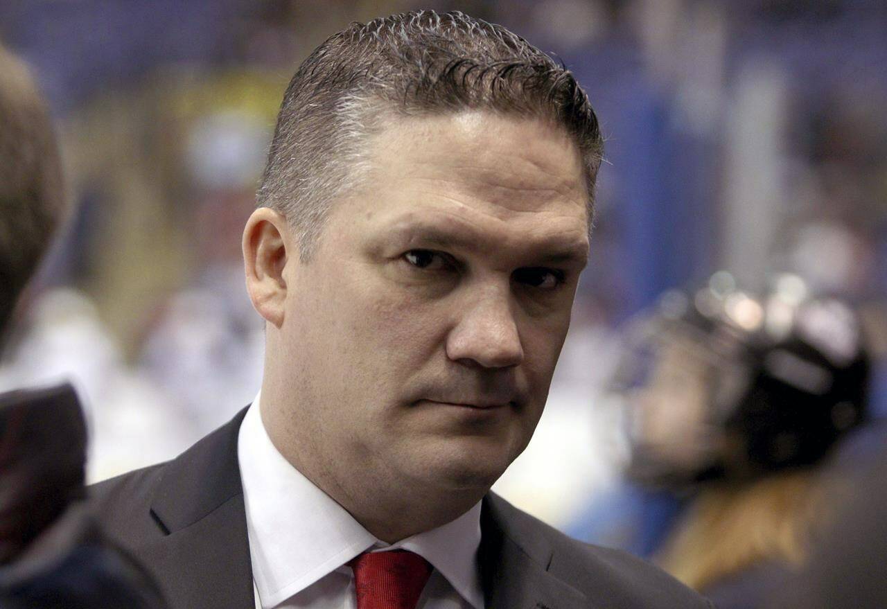 FILE - Team Canada’s head coach Troy Ryan looks on before a Rivalry Series game against Team USA in Victoria, British Columbia, Feb. 3, 2020. The newly launched Professional Women’s Hockey League is quickly taking shape. On Friday, Sept. 15, 2023, the yet-to-be-named six franchises announced their head coaches, with Canadian national team coach Ryan most notably being hired by Toronto, along with two of his assistants also landing jobs — Courtney Kessel (Boston) and Kori Cheverie (Montreal). (Chad Hipolito/The Canadian Press via AP, File)