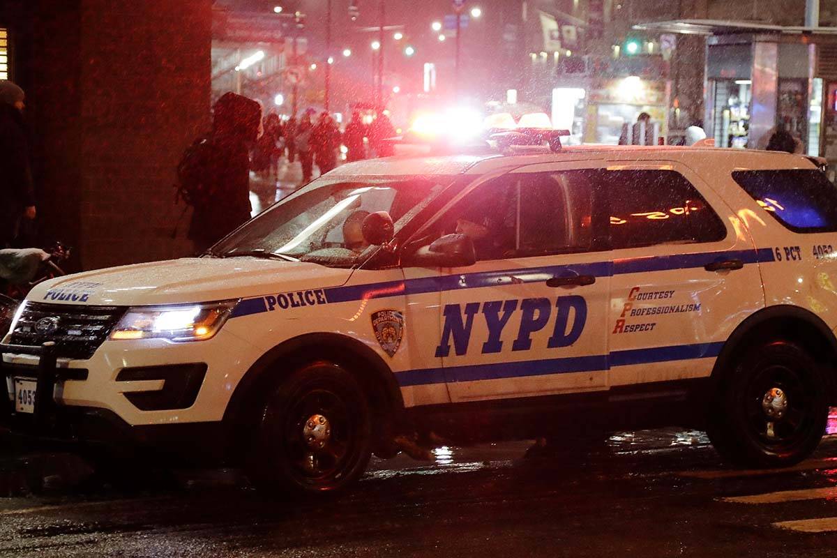FILE - An NYPD vehicle responds, Feb. 20, 2019, in New York. (AP Photo/Frank Franklin II, File)