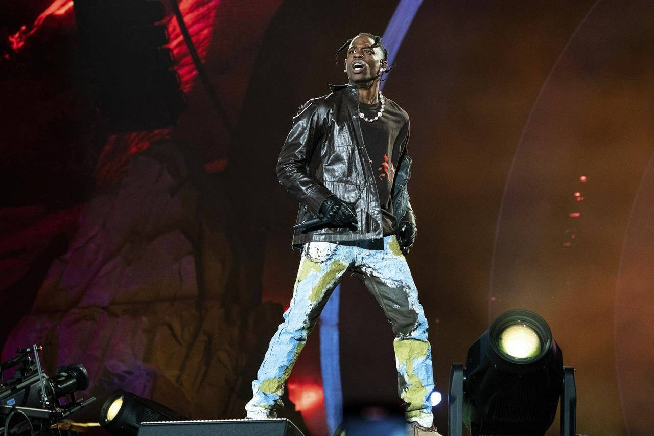 FILE - Travis Scott performs at Day 1 of the Astroworld Music Festival at NRG Park on Friday, Nov. 5, 2021, in Houston. The rap superstar was questioned on Monday, Sept. 18, 2023, in a deposition he is giving in connection with hundreds of lawsuits that were filed against him and others over the deaths and injuries at the 2021 Astroworld festival. (Photo by Amy Harris/Invision/AP, File)