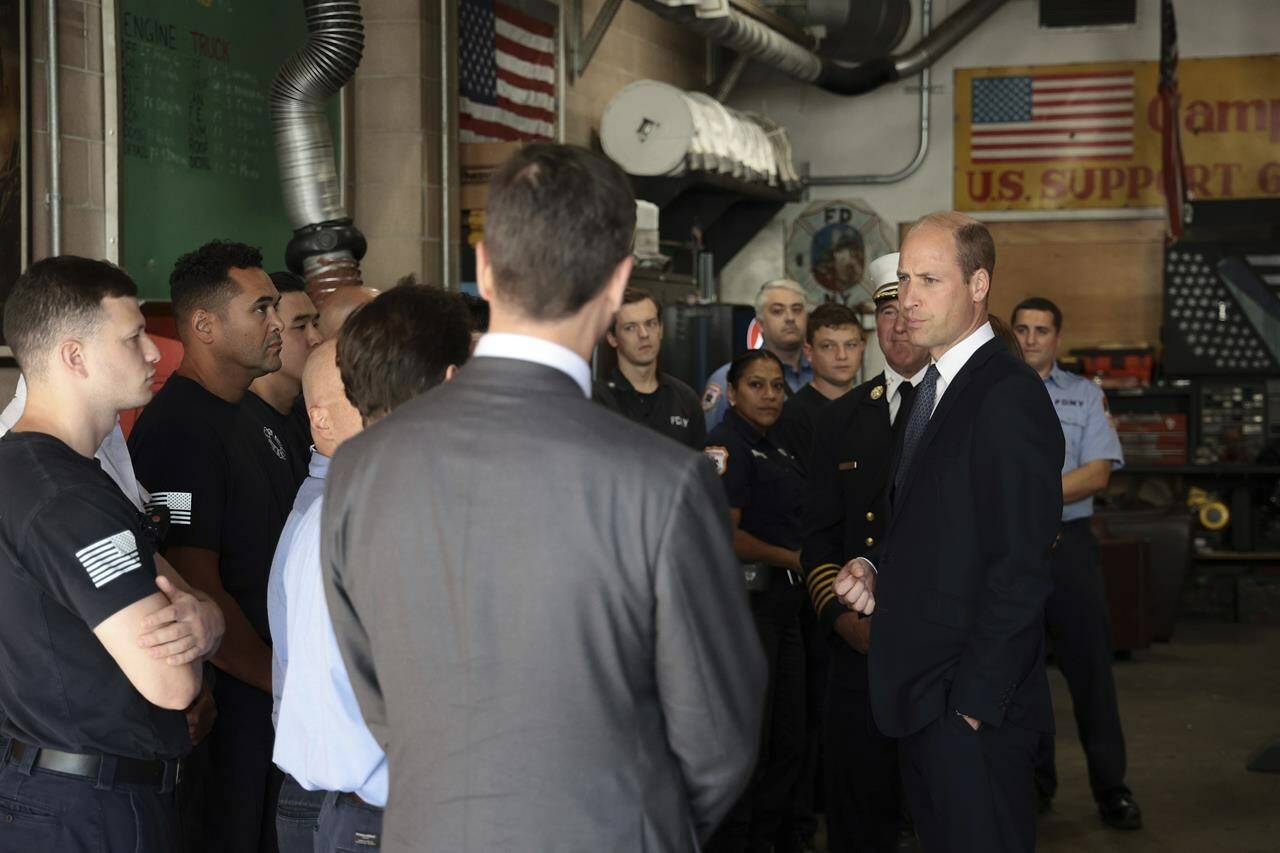 William, Prince of Wales, right, visits a FDNY Firehouse on on Tuesday, Sept. 19, 2023, in New York City. (Dimitrios Kambouris/Pool Photo via AP)