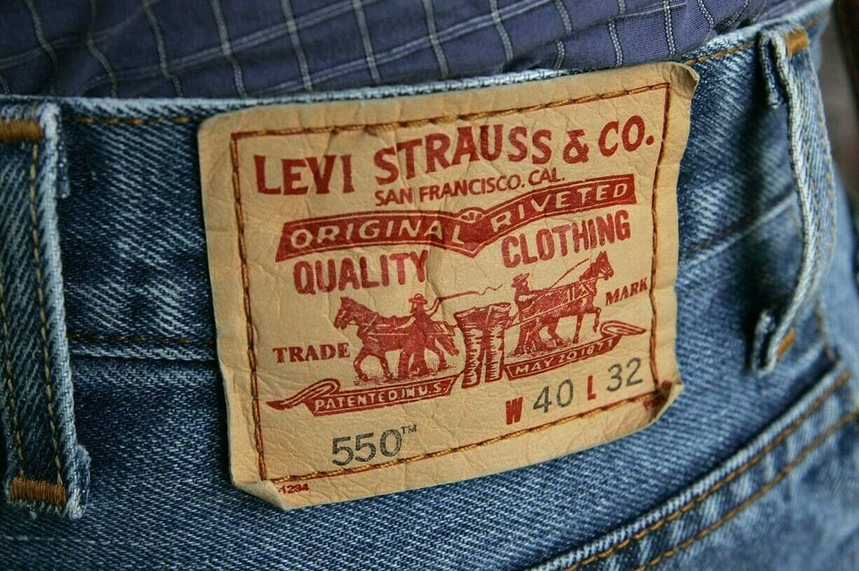 The familiar red tag from a pair of Levi's 550 jeans is seen Tuesday, Oct. 11, 2005, in San Francisco. Canada's corporate ethics watchdog has launched an investigation into allegations that Levi Strauss Canada is working with companies that use forced labour in China. THE CANADIAN PRESS/AP, Ben Margot