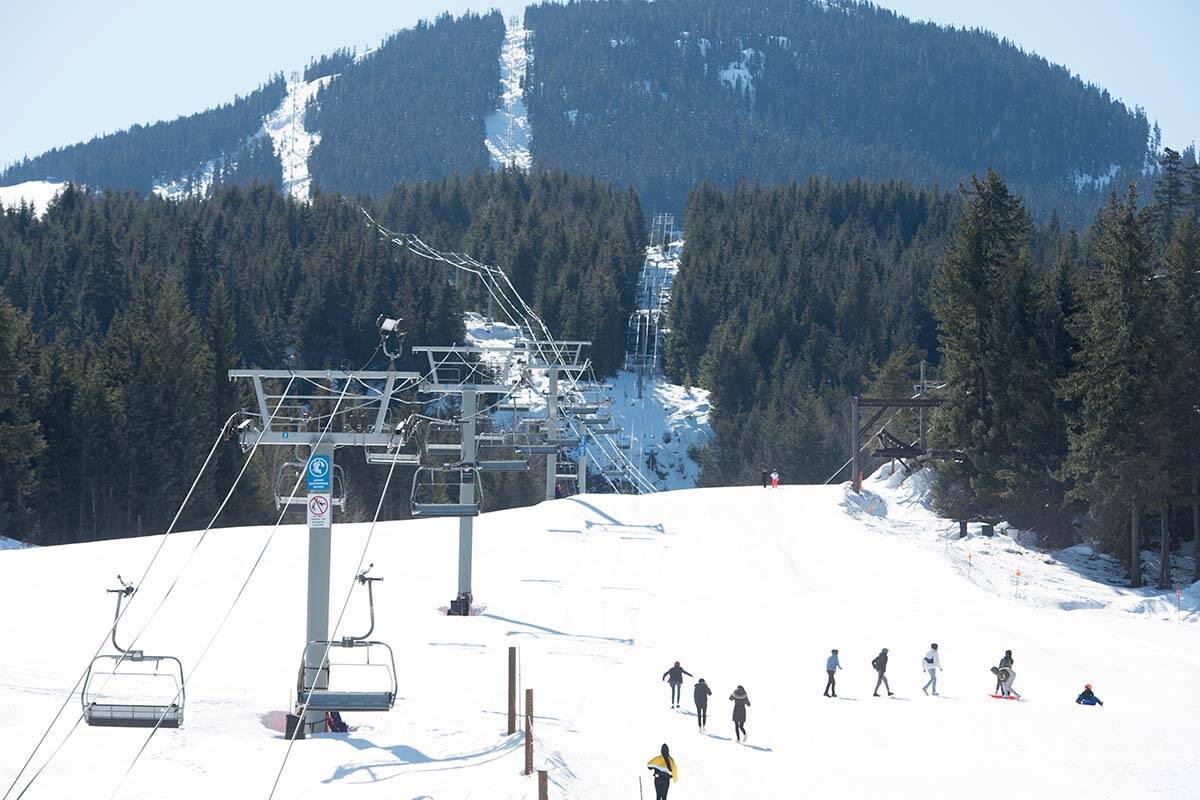 Children make their way up a closed Whistler Mountain to toboggan in Whistler, B.C. Sunday, March 15, 2020. A Vancouver man is suing the resort for the part he claims it played in him falling from a chairlift and fracturing his spine in 2016. THE CANADIAN PRESS/Jonathan Hayward
