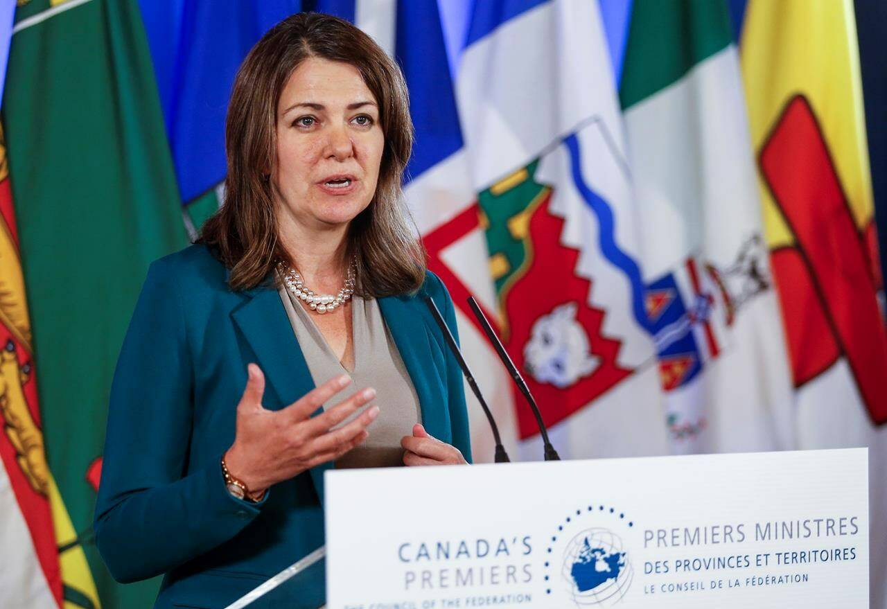 Danielle Smith, Premier of Alberta, speaks to media in Winnipeg, Tuesday, July 11, 2023. Smith is set to release a report that could lead to a vote on whether Alberta should ditch the Canada Pension Plan.. THE CANADIAN PRESS/John Woods