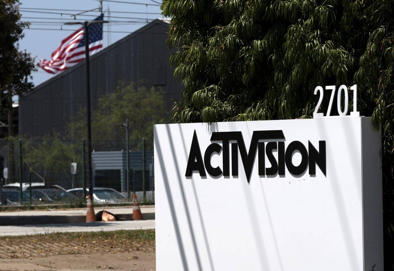 FILE - A sign outside the Activision building in Santa Monica, Calif., June 21, 2023. British competition regulators signaled Friday, Sept. 22 that Microsoft’s restructured $69 billion deal to buy video game maker Activision Blizzard is likely to receive antitrust approval by next month’s deadline. (AP Photo/Richard Vogel, File)