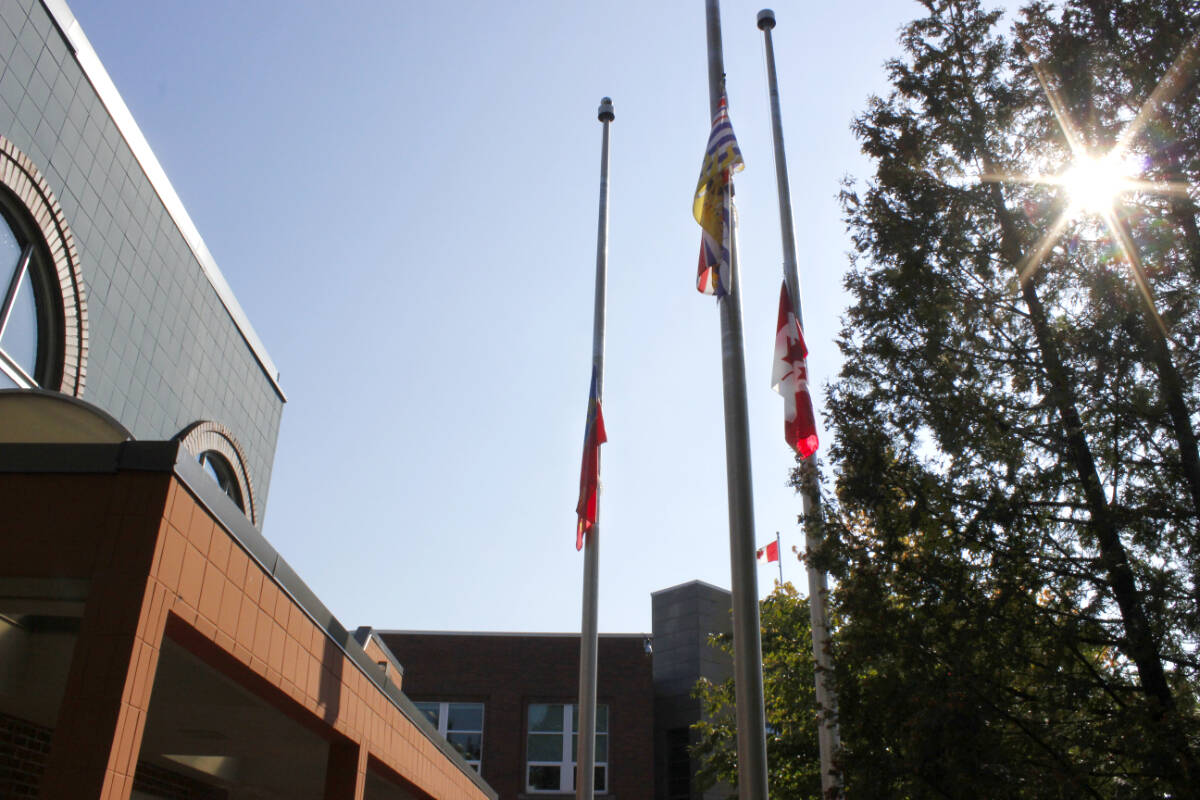 Ridge Meadows RCMP lowered its flags to half mast on Sept. 22 following a shooting in Coquitlam that resulted in one RCMP officer being killed and another wounded. (Brandon Tucker/The News)