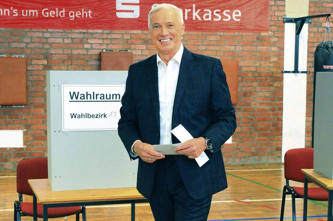 AfD candidate for mayor of Nordhausen, arrives at the polling station to cast his ballot, in Nordhausen, Germany, Sunday, Sept. 24, 2023. The German city of Nordhausen is best known as the location of the former Nazi concentration camp Mittelbau-Dora. A mayoral election on Sunday could again put the focus on the municipality of 42,000 people if a far-right candidate wins the vote. (Silvio Dietzel/dpa via AP)