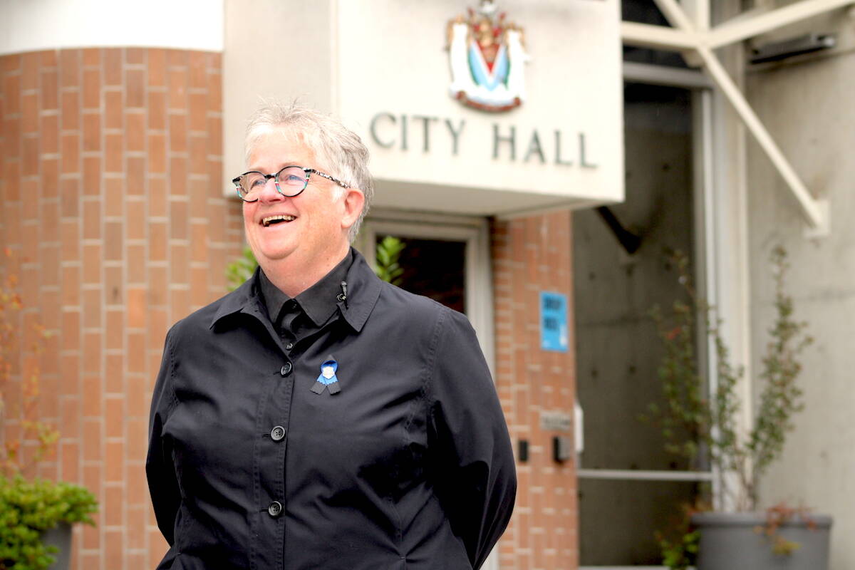 Victoria Mayor Marianne Alto outside city hall on Sept. 25 as she calls on the federal government to release housing funds that, in her view, are owed to the city. (Jake Romphf/ News Staff)