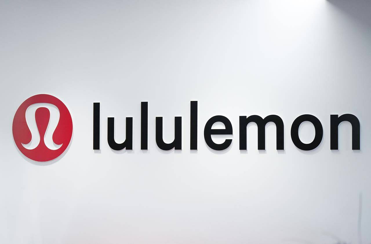 The Lululemon logo is seen on a wall at the company’s headquarters in Vancouver on Thursday, May 25, 2023. Lululemon Athletica Inc. says it has struck a five-year partnership with Peloton Interactive Inc. THE CANADIAN PRESS/Darryl Dyck
