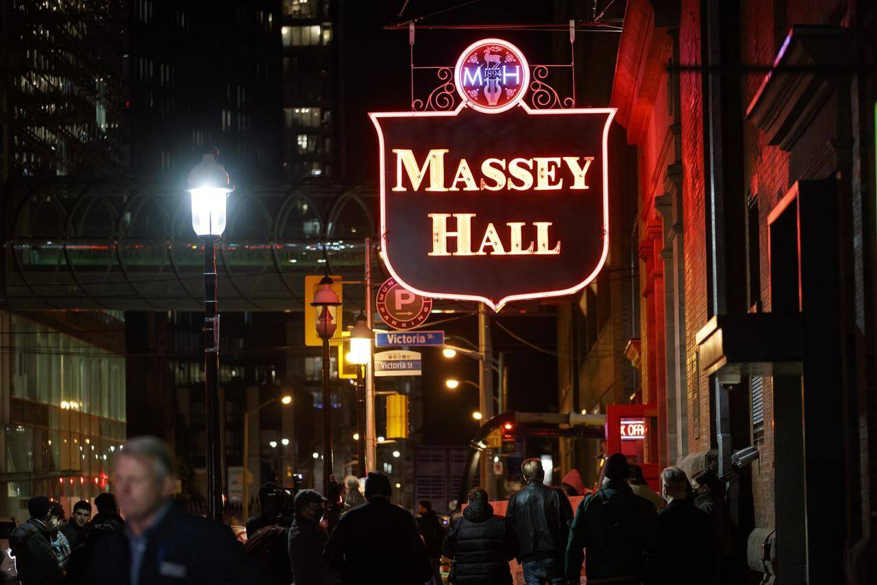 Thirteen of the country’s most influential rock acts of the 1970s and 1980s are being added to Canada’s Walk of Fame with the bands set to be toasted at Toronto’s Massey Hall as part of a “mega-induction” ceremony. The Massey Hall sign is lit up in Toronto, Wednesday, Nov. 24, 2021. THE CANADIAN PRESS/Cole Burston