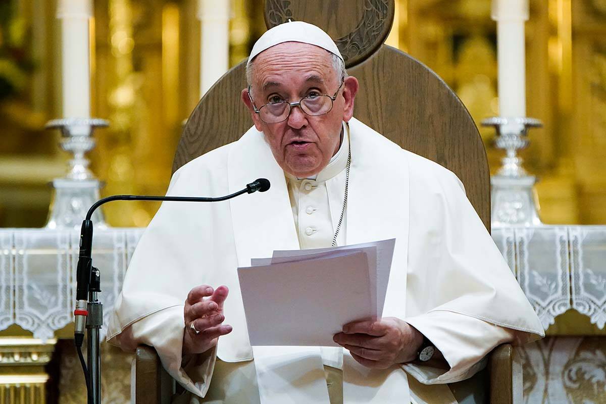 Pope Francis presides over a Vespers service at the Cathedral-Basilica of Notre Dame de Quebec in 2022. When did the Roman Catholic Church give a papal apology for the church’s role in Canada’s residential schools? (AP Photo/John Locher)