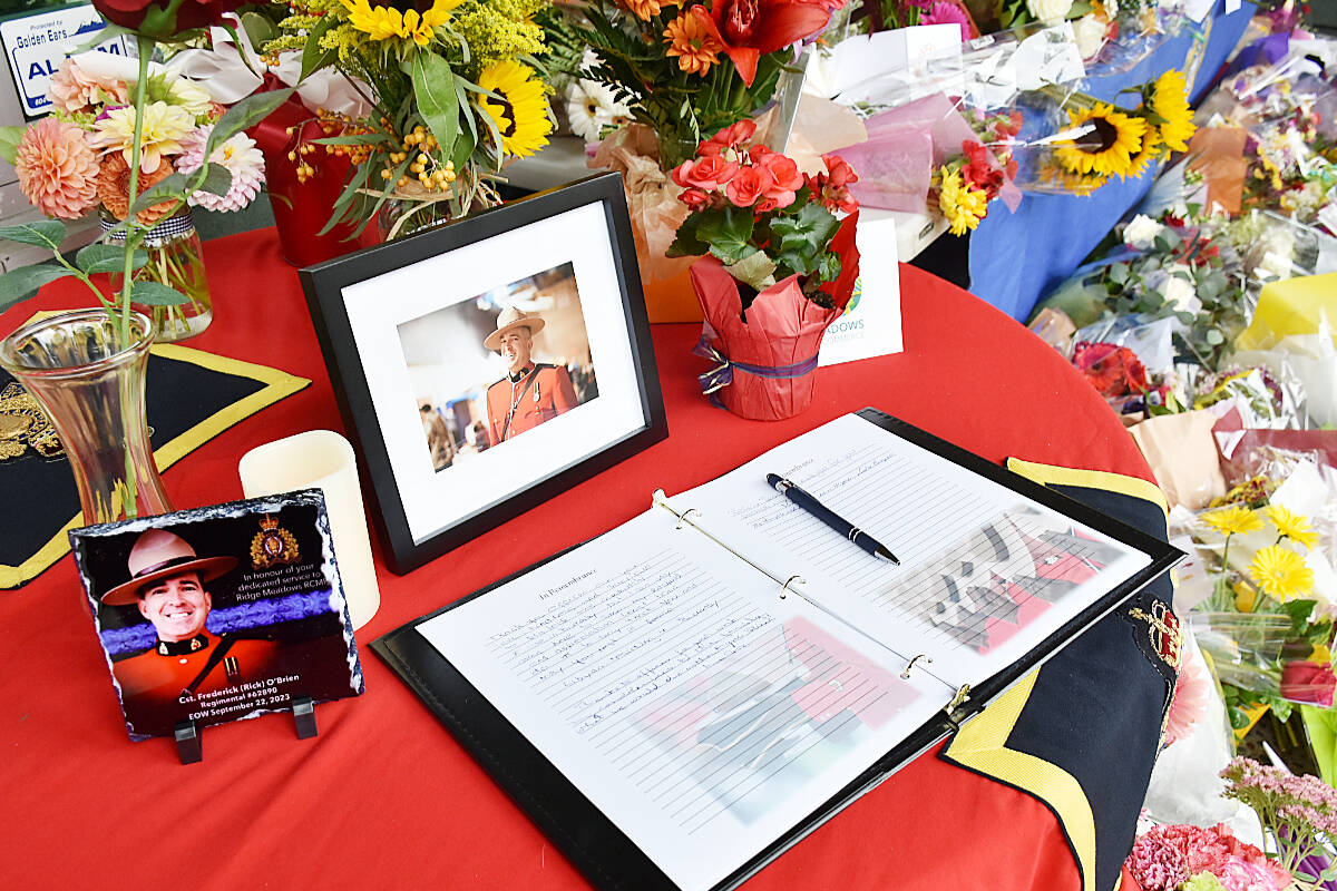 A book of condolences is available to sign for the family of Ridge Meadows RCMP Const. Rick O’Brien, a 51-year-old father of six from Langley, who was shot to death while executing a search warrant in Coquitlam on Sept. 22, 2023.(Colleen Flanagan/Black Press Media)