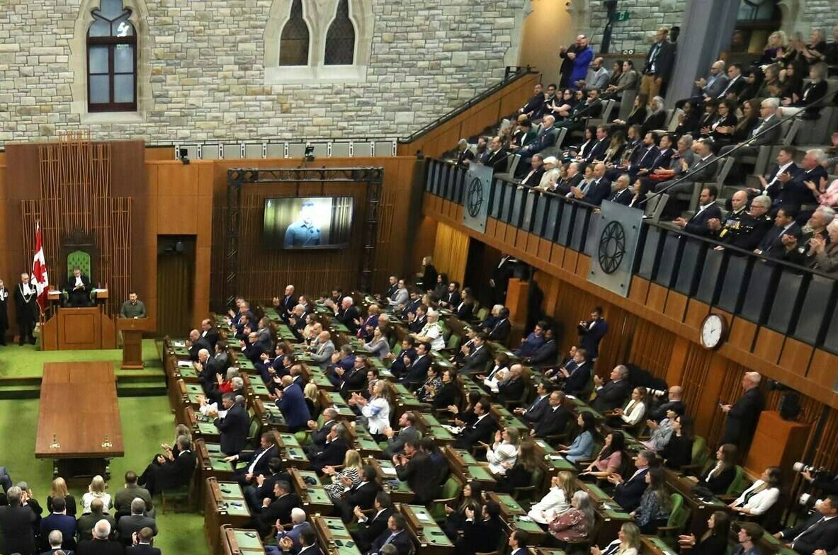 Overall view of Ukrainian President Volodymyr Zelenskyy speaking in the House of Commons in Ottawa on Friday, Sept. 22, 2023. Yaroslav Hunka watches and applauds at far right, centre. It later emerged that Hunka had fought in Ukraine during the Second World War with the Waffen-SS Galicia Division, a volunteer unit created by the Nazis to help fight the Soviet Union. THE CANADIAN PRESS/Patrick Doyle