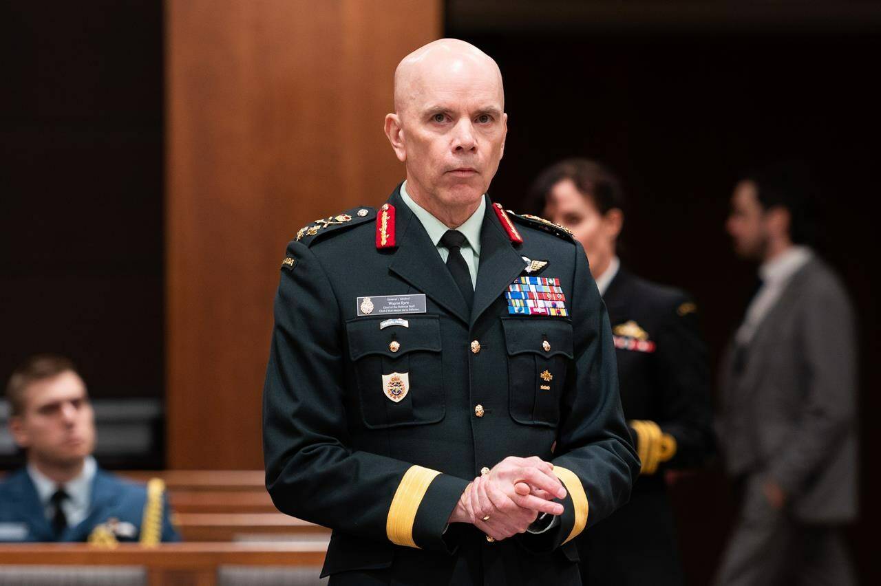 Chief of the defence staff Gen. Wayne Eyre waits to appear before the Standing Commitee on National Defence in Ottawa on Thursday, Sept. 28, 2023. The country’s top soldier and outside experts agree cutting almost $1 billion from the Department of National Defence budget will affect the Armed Forces’ capabilities. THE CANADIAN PRESS/Spencer Colby